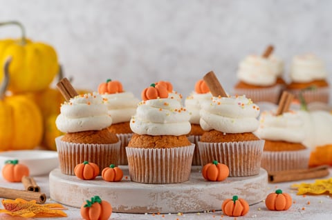 Pumpkin spice cupcakes with decorative frosting