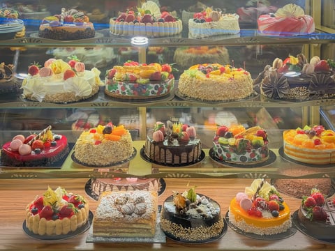 Assorted cakes in bakery display