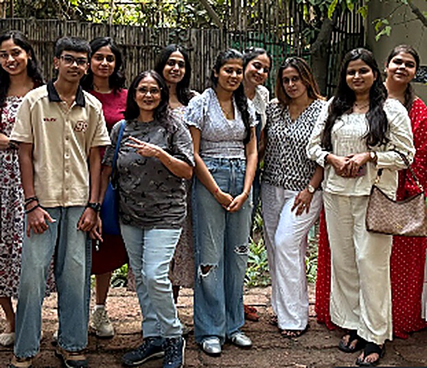 Group of workshop attendees posing outdoors